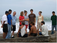 prayer group on beach